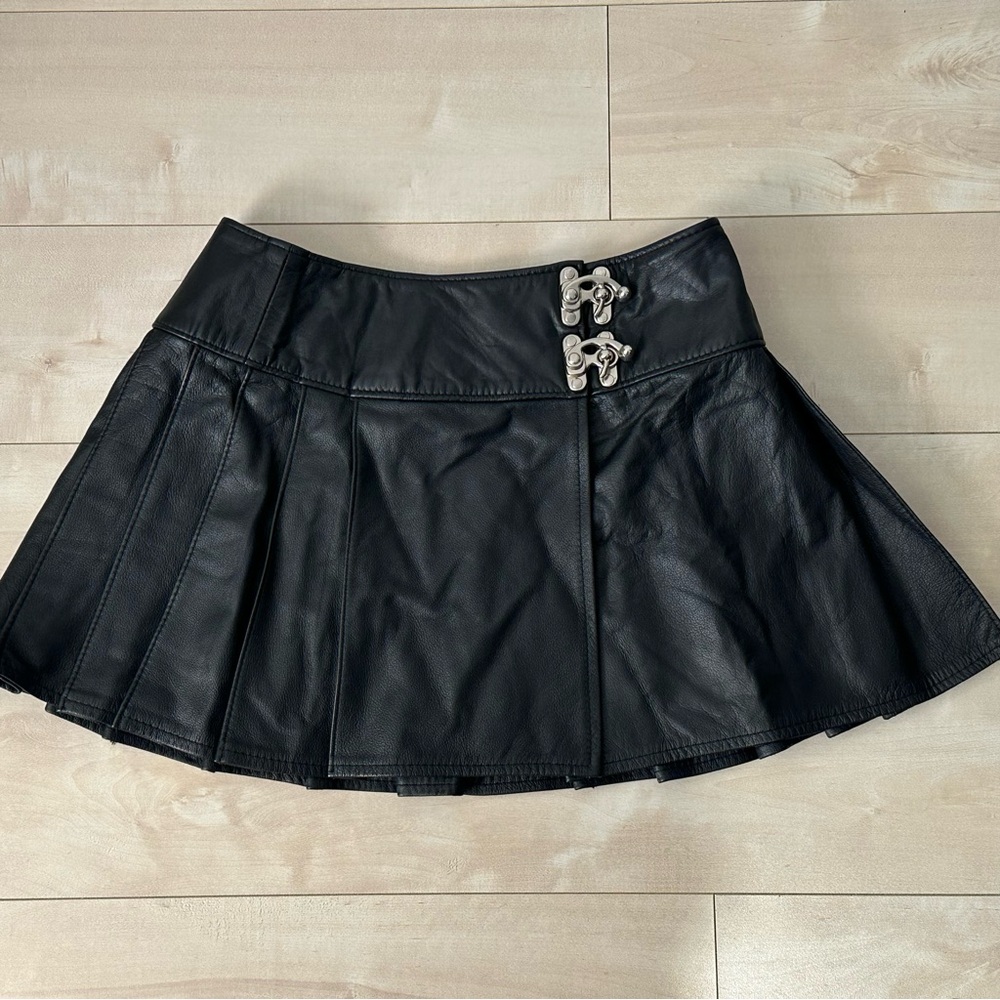 Black Pleated Skirt with Buckle Detail